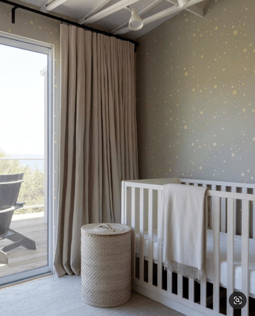 Starry Night Baby Boy Nursery with green wall and yellow stars