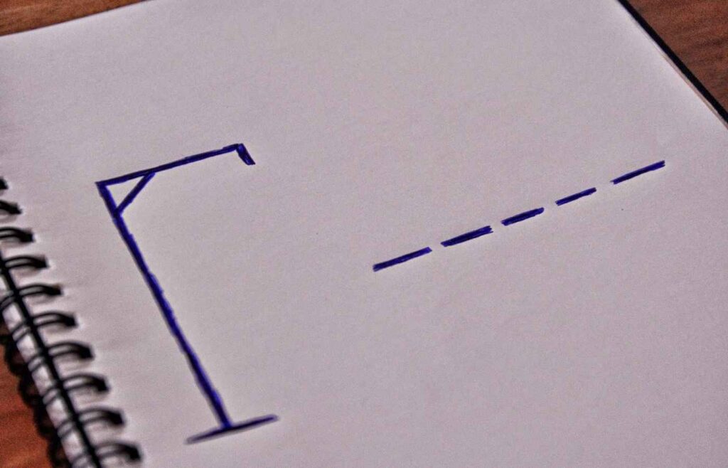 Hangman is played on a piece of paper.