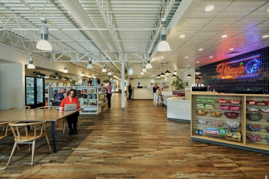 Fitzgerald Pharmacy renovation, overview of space, neon sign, various candies.