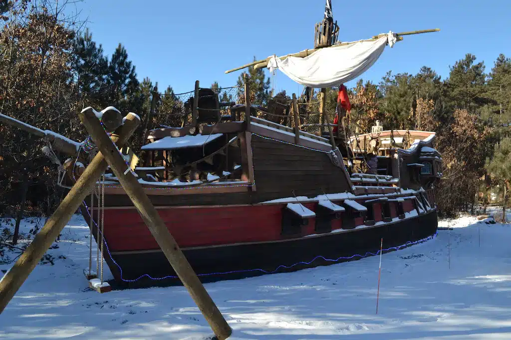 Pirate ship hotel covered in snow in Wisconsin Dells