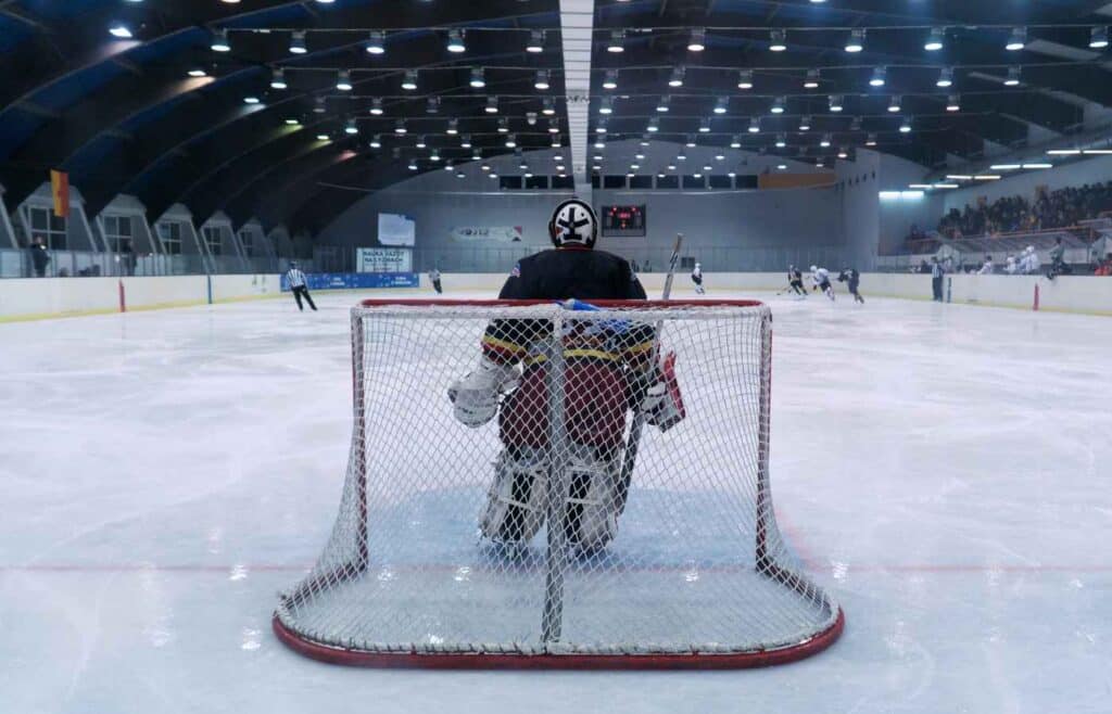 hockey goalie and ice rink