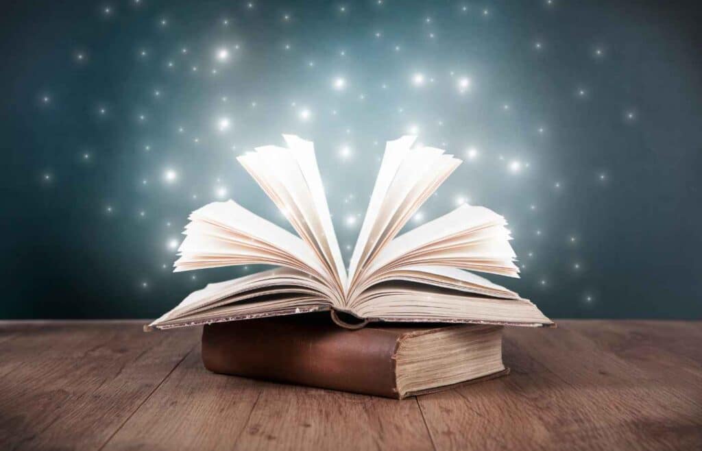 Open book with sparkles