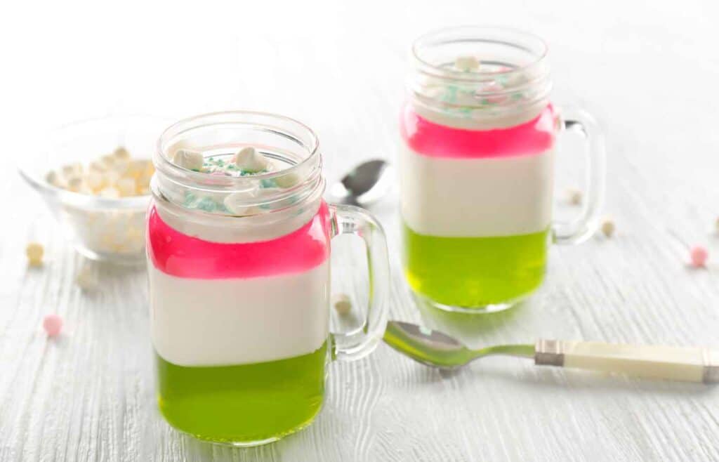 glass jars of layered jello