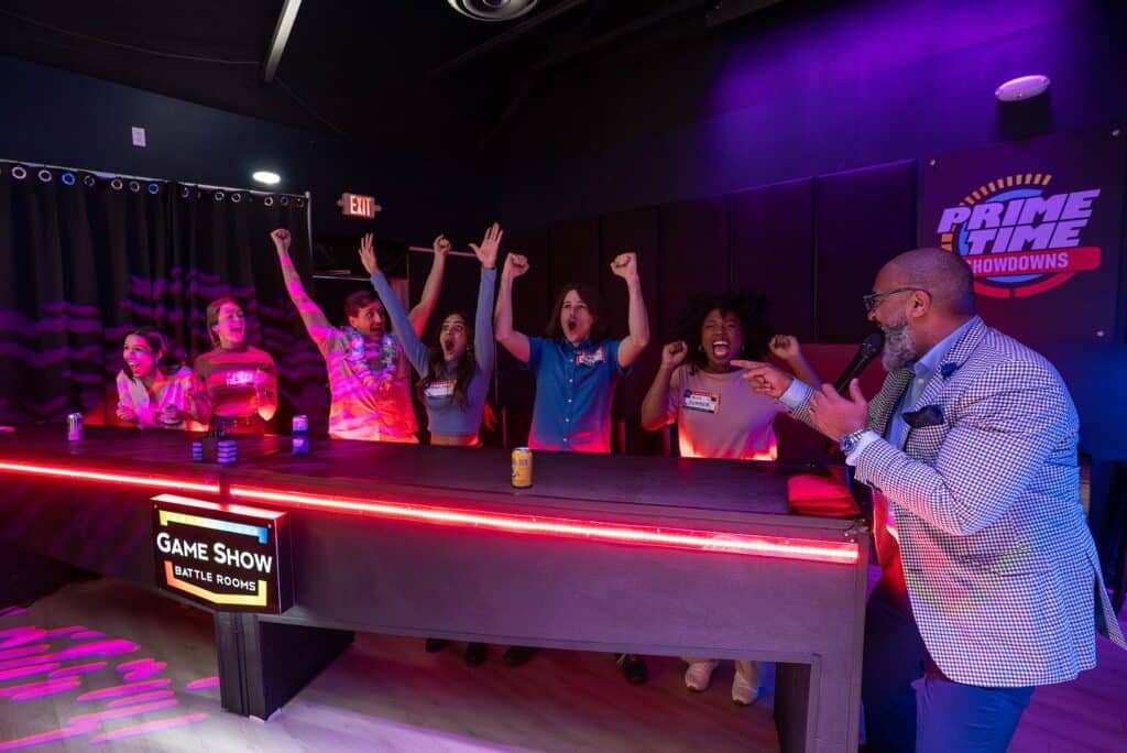 Teenagers playing at a game show entertainment center in Brookfield