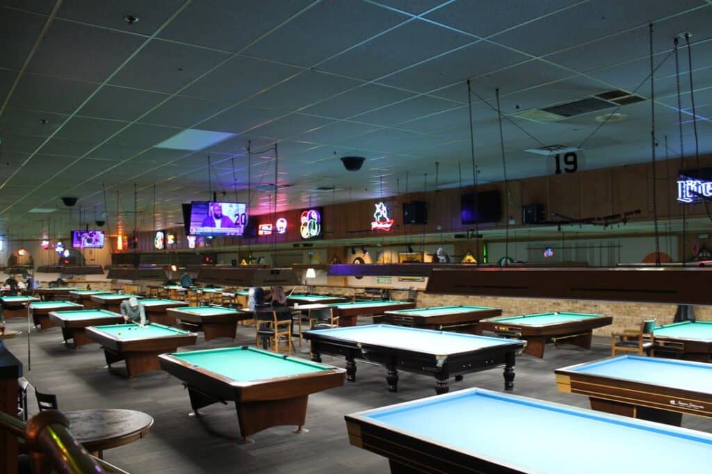 Several billiards table in a family-friendly bar and restaurant