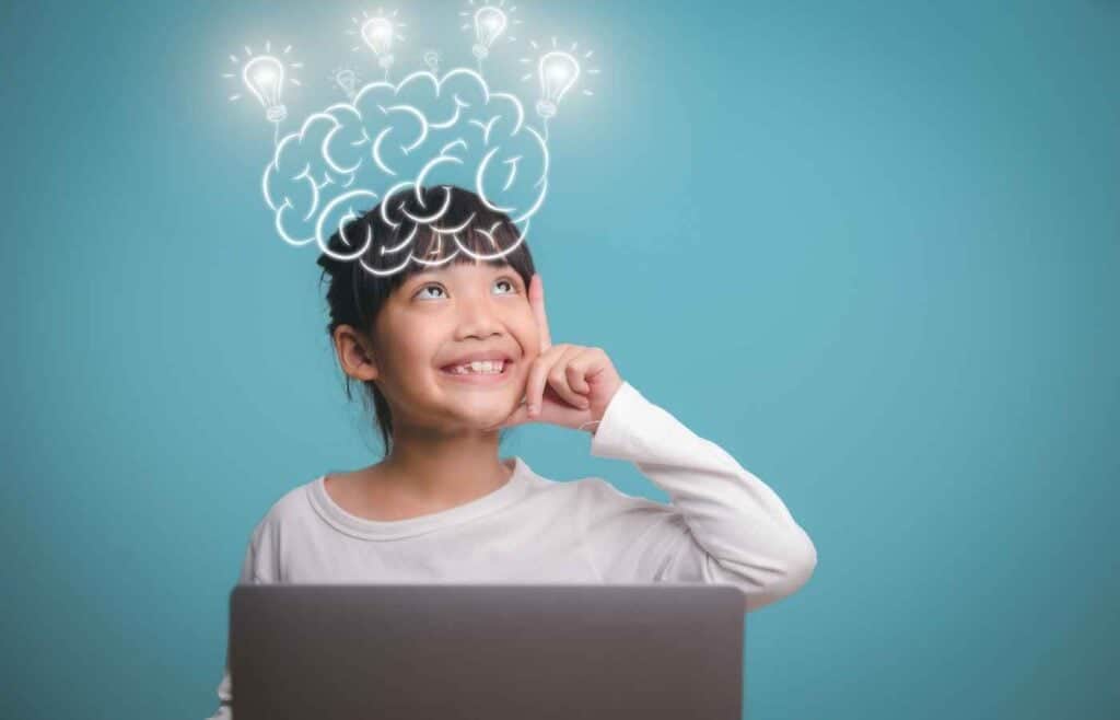 Young girl smiling while thinking with an illustration of lightbulbs and a brain over her head, representing ideas and learning in a miscellaneous section of science trivia.